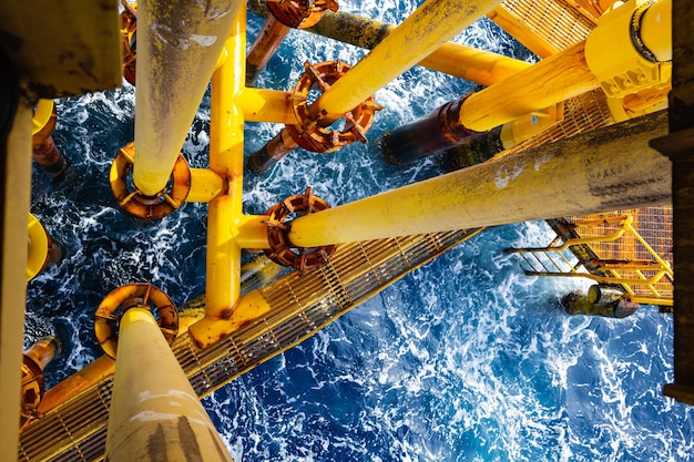 Offshore drill yellow oil and gas production petroleum pipeline.