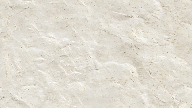 Offwhite crumpled paper texture background with subtle light and shadow