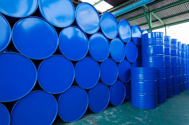 Oil barrels blue or chemical drums horizontal stacked up