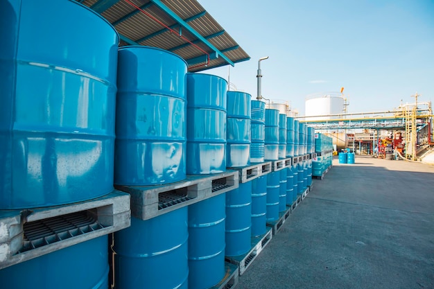 Oil barrels blue or chemical drums vertical stacked up