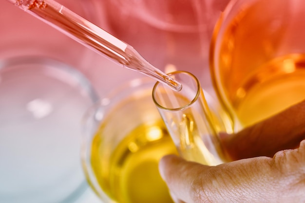 Oil dropping Chemical reagent mixing Laboratory and science experiments Formulating the chemical for medical research Quality control of petroleum industry products concept