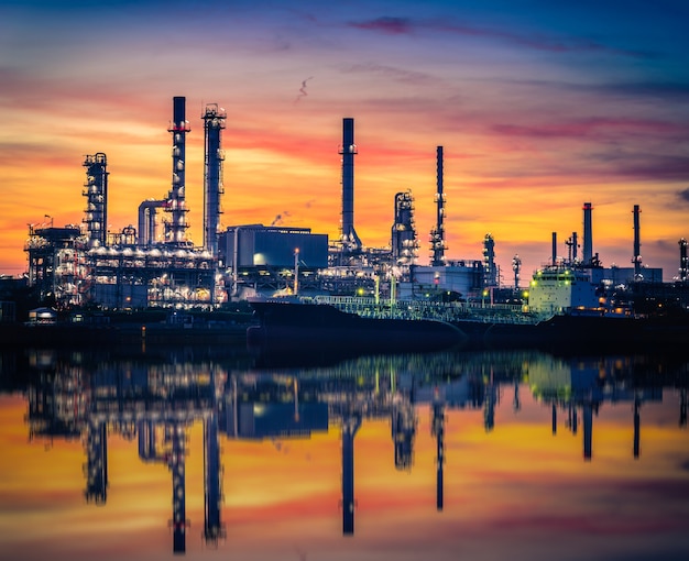 Oil and gas Refinery factory with beautiful sky at sunrise.