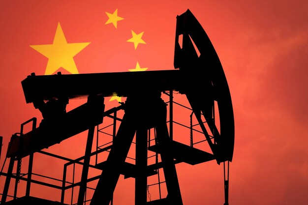 Oil pump on background of flag of China