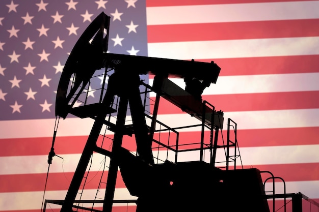 Oil pump on background of flag of USA