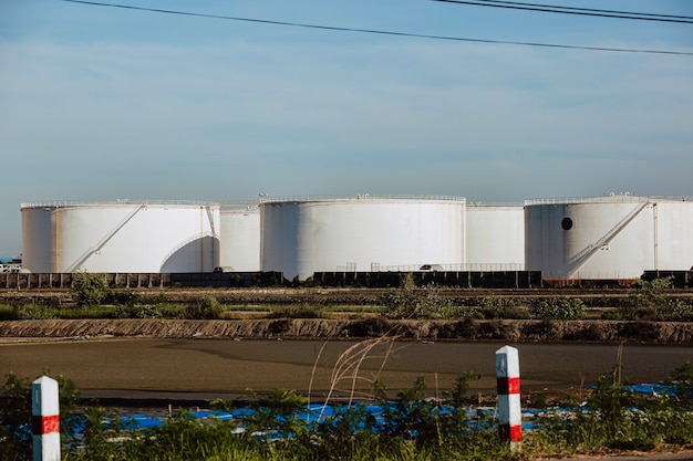 Oil storage tank with oil refinery plant  pipeline background blue sky