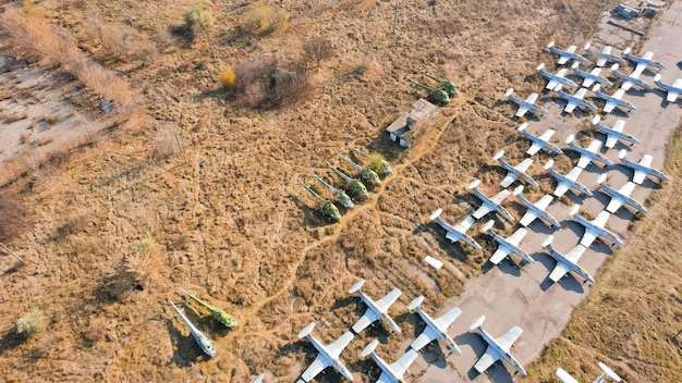 Old abandoned airfield with abandoned planes and helicopters World Airplane Aircraft Army Aviation Grass Road Soviet Top Fly Jet Airport Air Fuselage