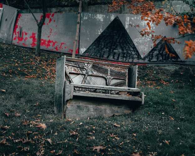 Old abandoned broken piano left outdoors