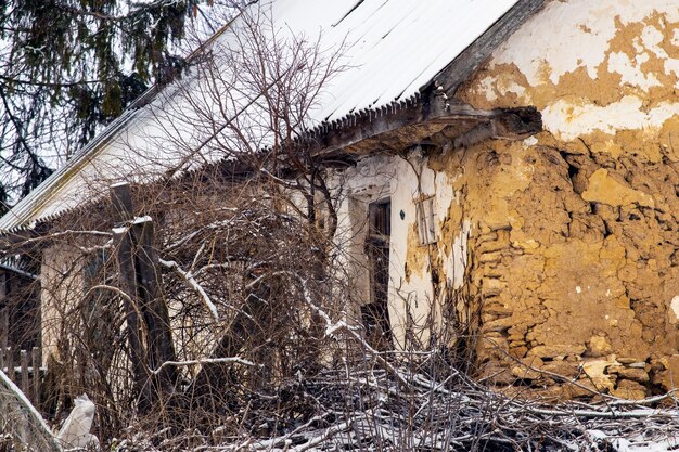 Old abandoned house in the countryside in winter