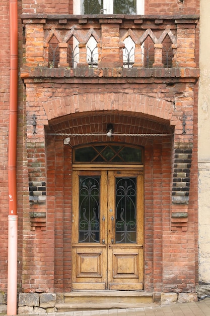 Old ancient wooden door texture in european medieval style