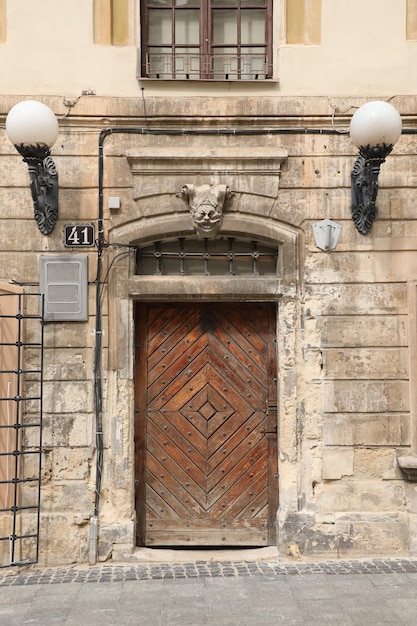 Old ancient wooden door texture in european medieval style