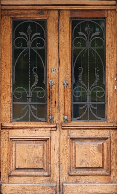 Old ancient wooden door texture in european medieval style