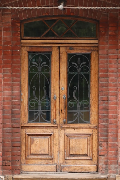 Old ancient wooden door texture in european medieval style