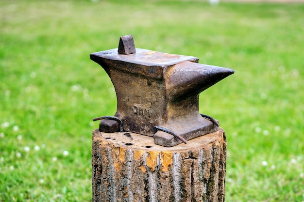 The old anvil is on the stump