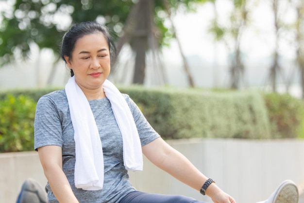 Old Asian woman exercise outdoor Asian woman happy retirement