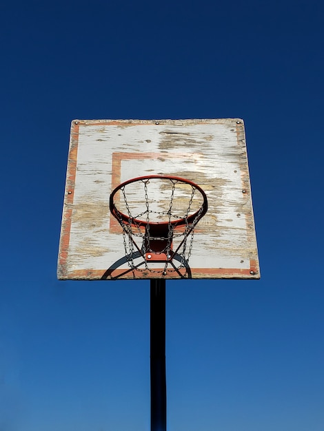 Old Basketball hoop in a basketball arena.