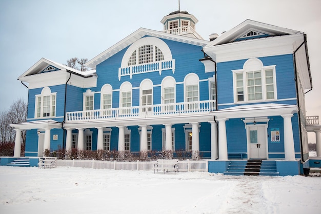 An old beautiful mansion with a wooden veranda, built in the 19th century in Cherepovets, Russia