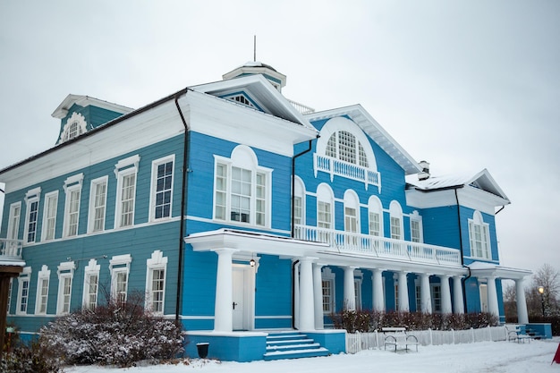 An old beautiful mansion with a wooden veranda, built in the 19th century in Cherepovets, Russia