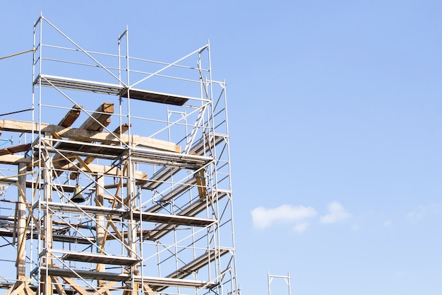 The old bell tower. Restoration of the old bell tower. Scaffolding. Old bell