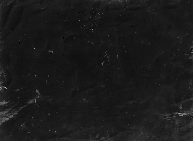 Old black grunge background. Dark wallpaper