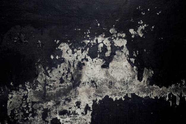 Old black paint texture peeling off concrete wall background