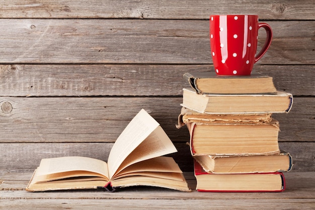 Old books and coffee cup