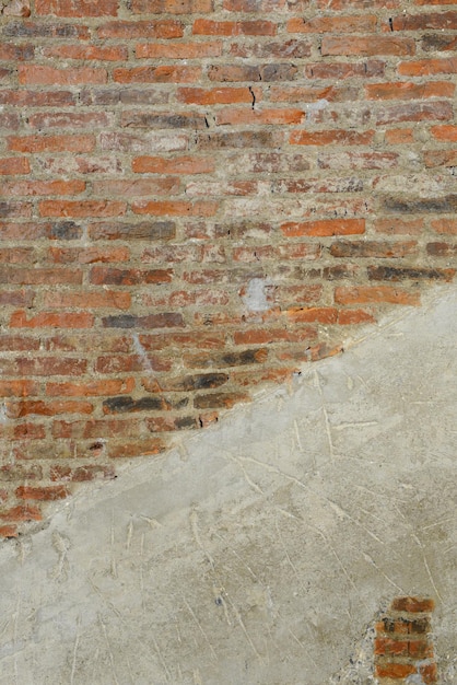 Old brick wall and concrete texture background of decorate