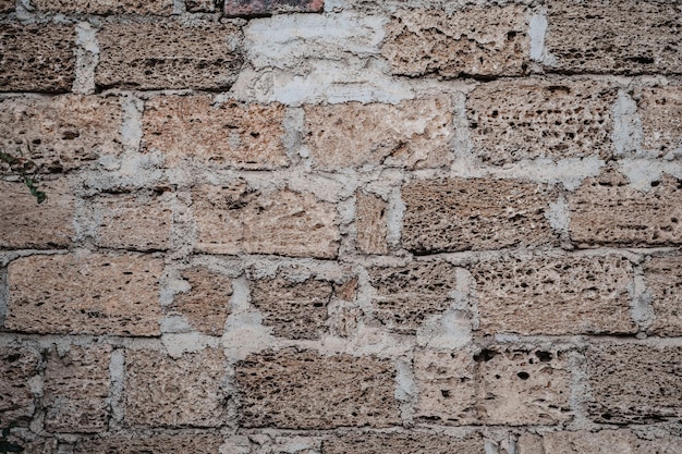 An old brick wall the facade of the building Abstract texture background