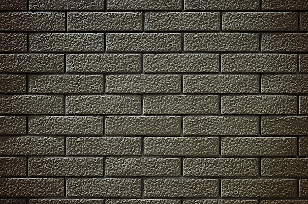 Old brown black brick wall texture background.