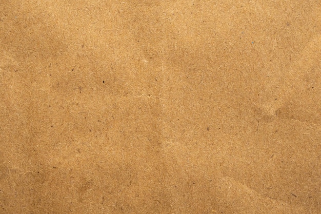 Old brown eco recycled kraft paper texture cardboard background