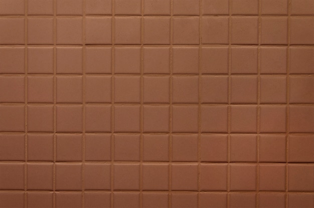 Old brown tile wall background