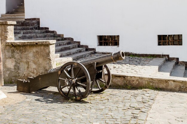 Old cannon in the courtyard of Palanok castle in the city of Mukachevo UkrainexA