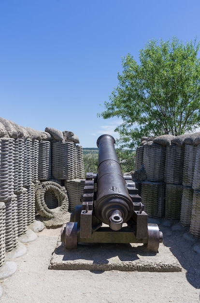 old castiron cannon in a combat position