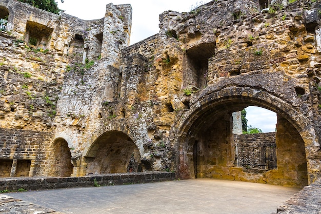 Old castle ruins, ancient stone building facade. European architecture, medieval town, famous place