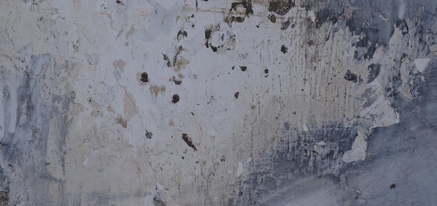 Old cement full of stains and scratches can be used as a background