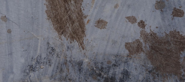 Old cement full of stains and scratches can be used as a background