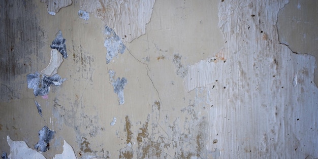 Old cement full of stains and scratches can be used as a background