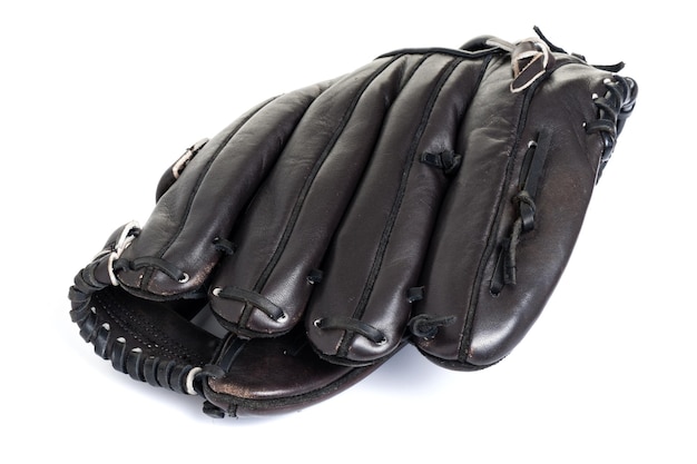 Old chocolate brown baseball glove isolated over white background