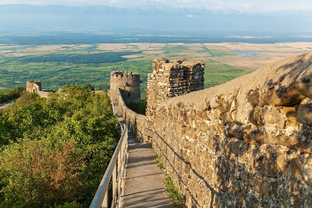 Old city wall from stones with towers round a city Sighnaghi. Kakheti. Georgia. It is City of Love in Georgia.