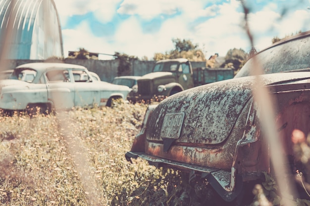 Old classic russian car near road. Photo in old image style