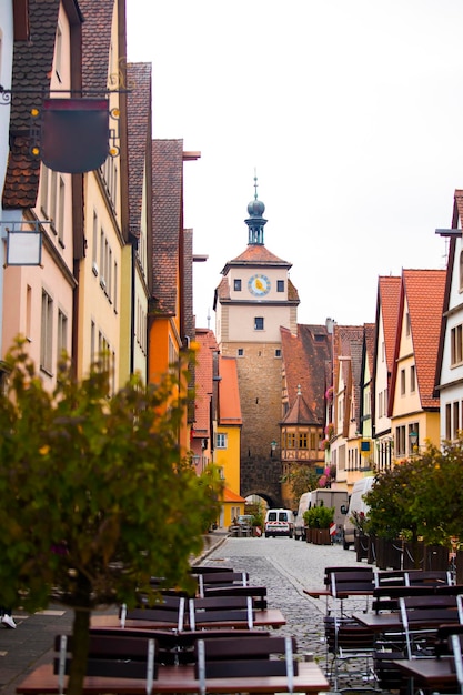 The old clock tower on the streets of the fairy tale town of Rothenburg, Germany