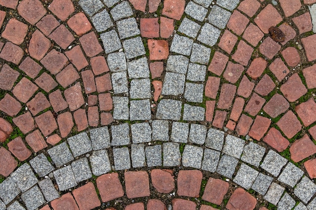 Old cobblestone tile texture in old town