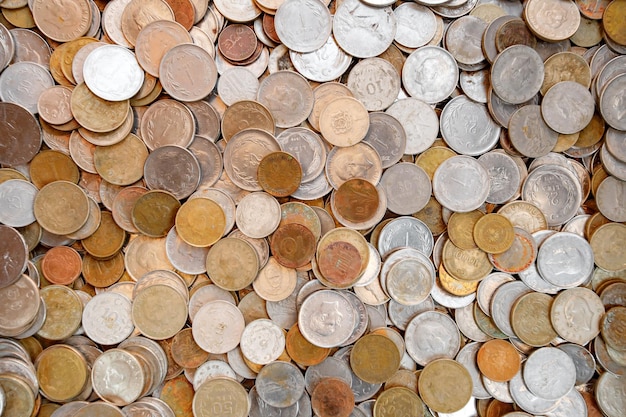 Old coins Turkish lira and other money with touch set in bulk in pile top view