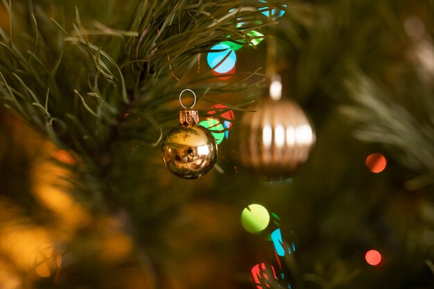 Old colorful Christmas decorations with fur-tree and toys