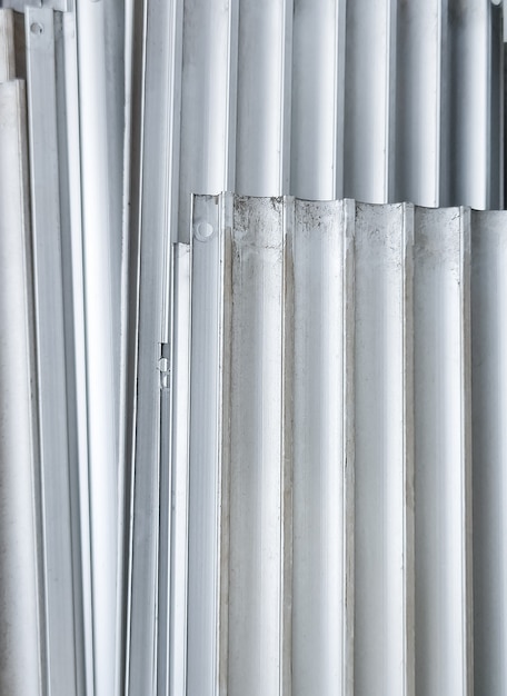 Old corrugated aluminum sheet for interior and exterior applications.