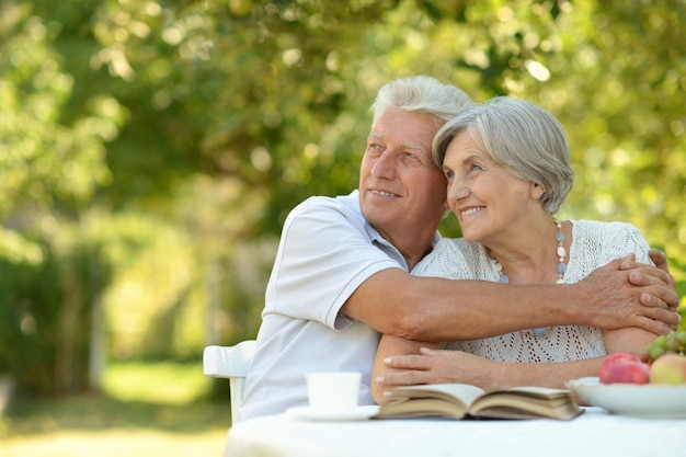 Old couple with book