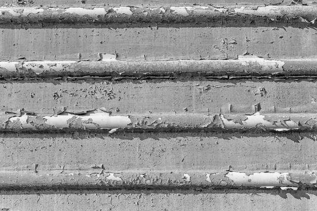 Old cracked rusty paint  background texture close-up black and white