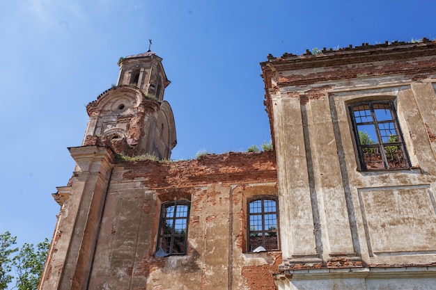 Old destroyed church Ruins of catholic Church Old dilapidated building with red brick columns Historical value 18th century Lyskovo Belarus