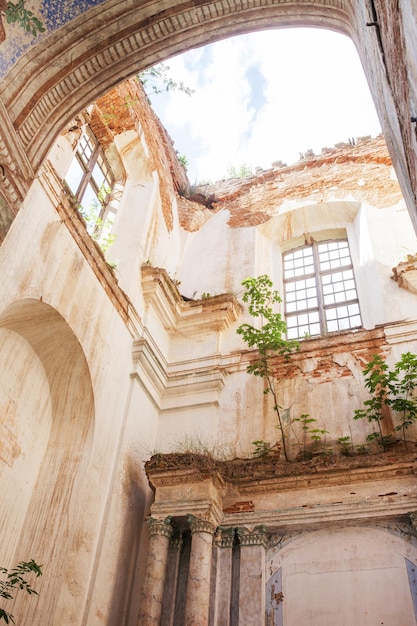 Old destroyed church Ruins of catholic Church Old dilapidated building with red brick columns Historical value 18th century Lyskovo Belarus