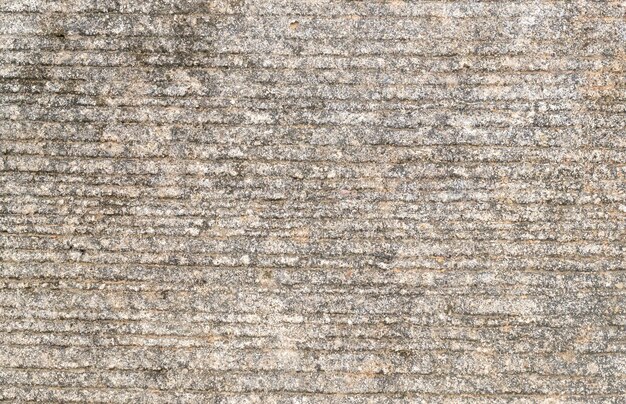 Old dirty grey concrete background texture used for in decorative art work Gray concrete wall texture with strange horizontal stripes