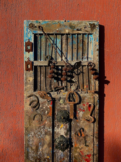 Old door on rustic wall